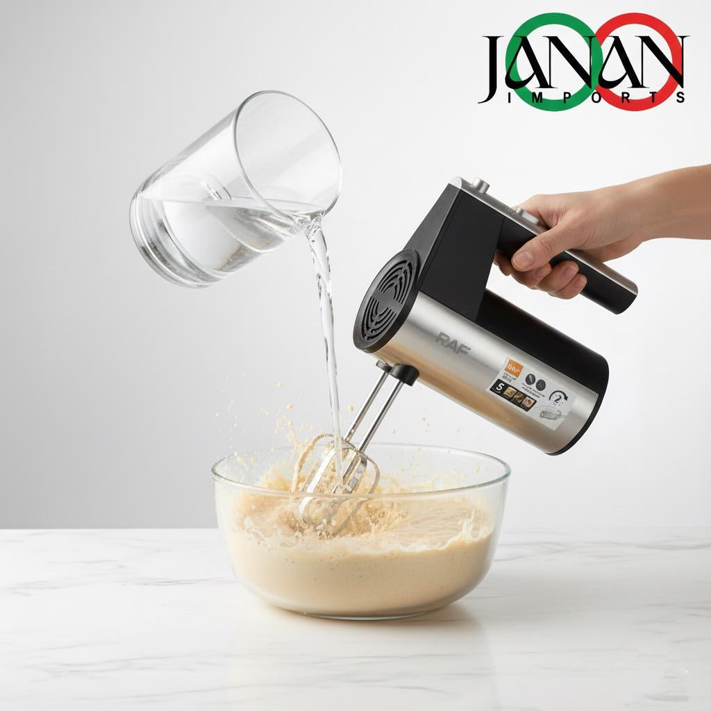 Hand mixer being used to blend ingredients in a bowl with a glass of water on a white background, featuring the Janan Imports brand.